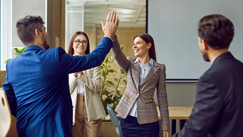 Business people high five happy team celebration or office greeting. Startup becoming radically productive, leadership and communications skills development, successful coaching or management